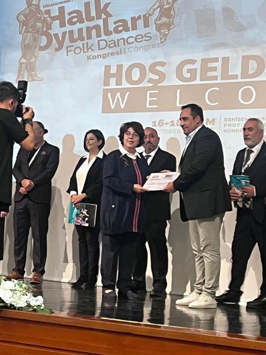 Uluslararası Halk Oyunları Kongresi 2025: katılım belgesi takdimi